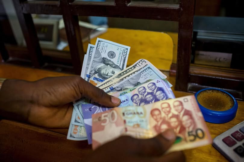 Ghana Cedi is down
