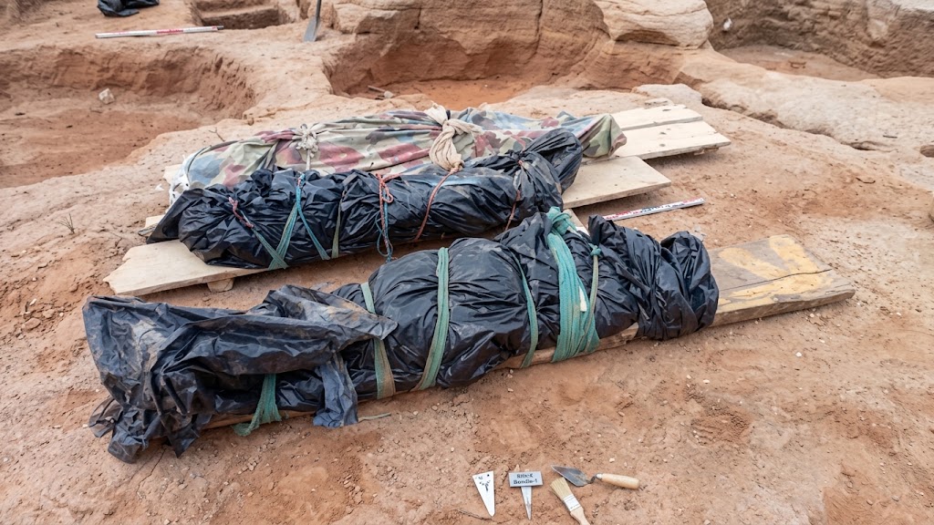 At least seven people have died and four others remain trapped