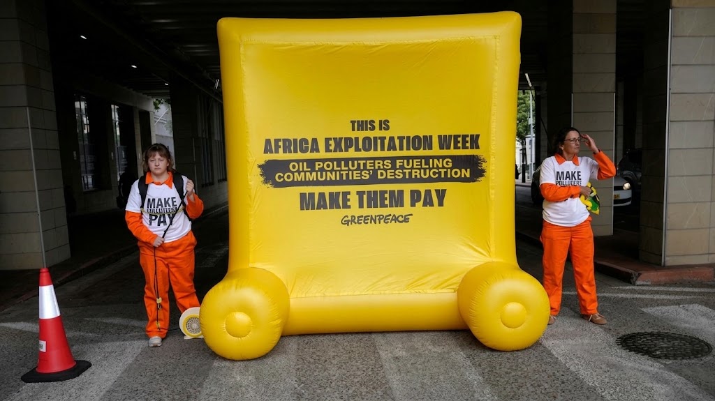 Climate activists picketed outside the African